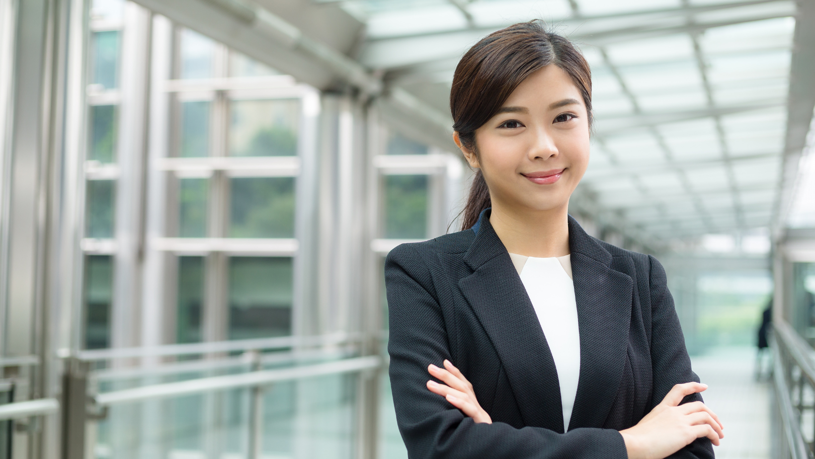 Chinese lady professional in coat and suit